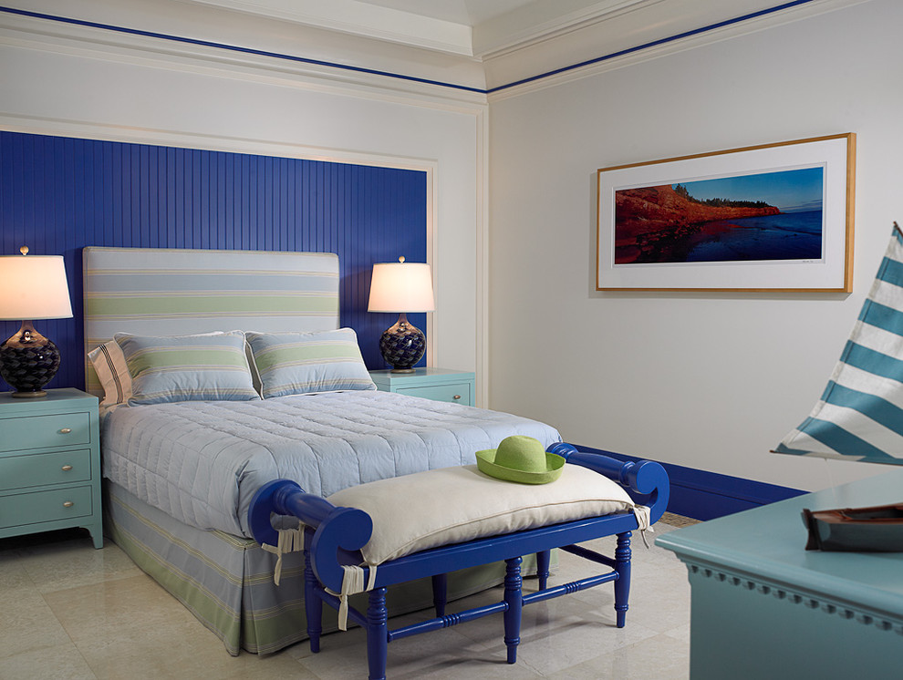 Inspiration for a tropical bedroom in Toronto with blue walls.