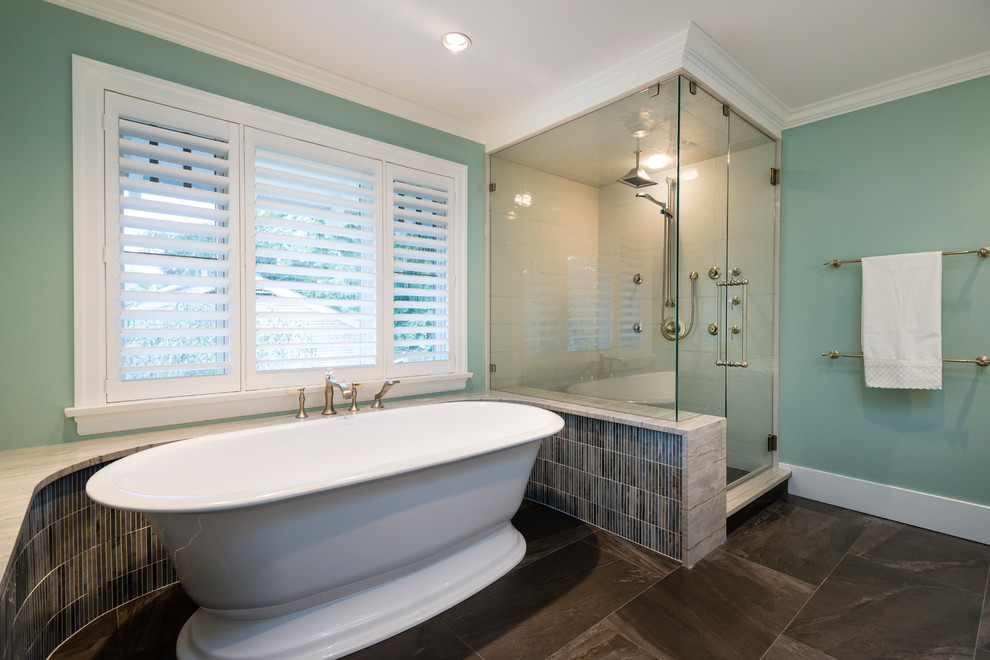 Large traditional master bathroom in Vancouver with furniture-like cabinets, white cabinets, a freestanding tub, a corner shower, gray tile, blue walls and an undermount sink.