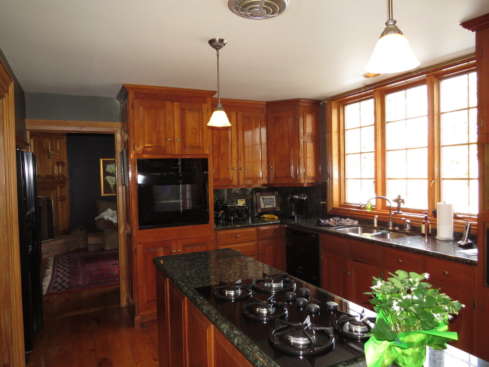 Example of a transitional kitchen design in Toronto