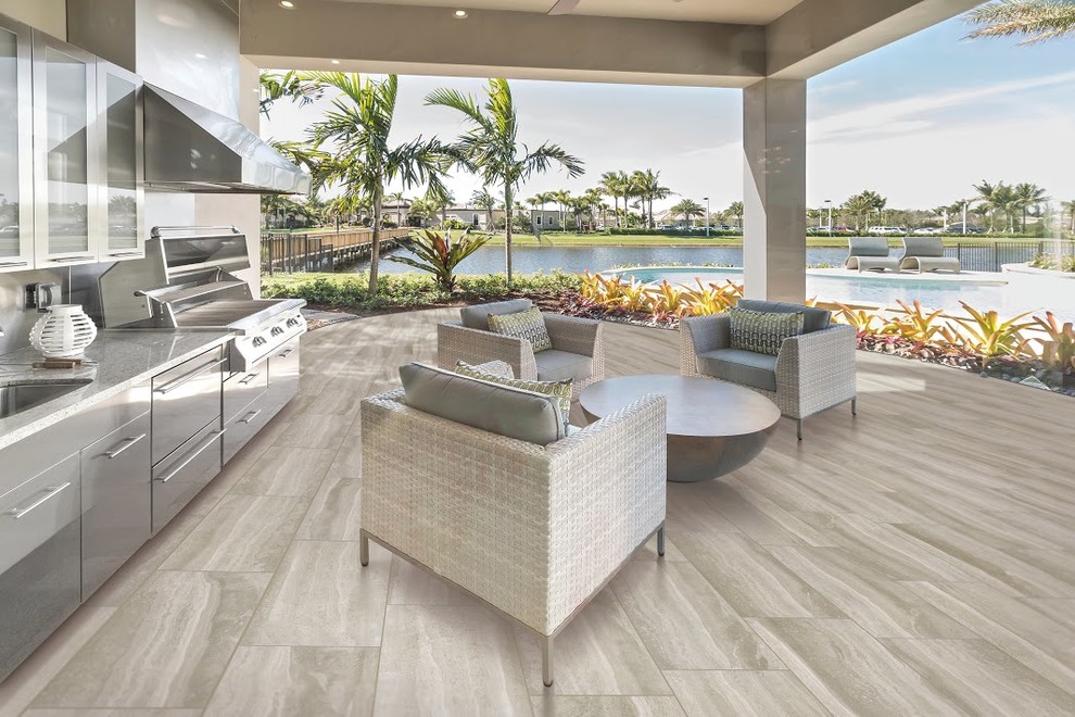 Inspiration for a modern backyard tile patio kitchen remodel in Indianapolis with a roof extension