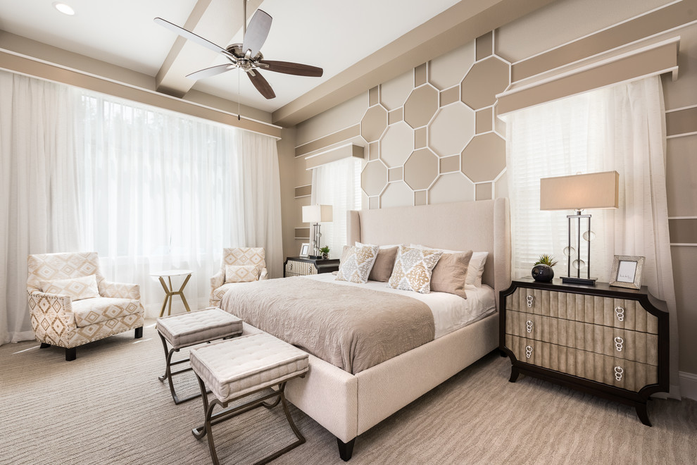 This is an example of a transitional master bedroom in Orlando with beige walls, carpet and grey floor.