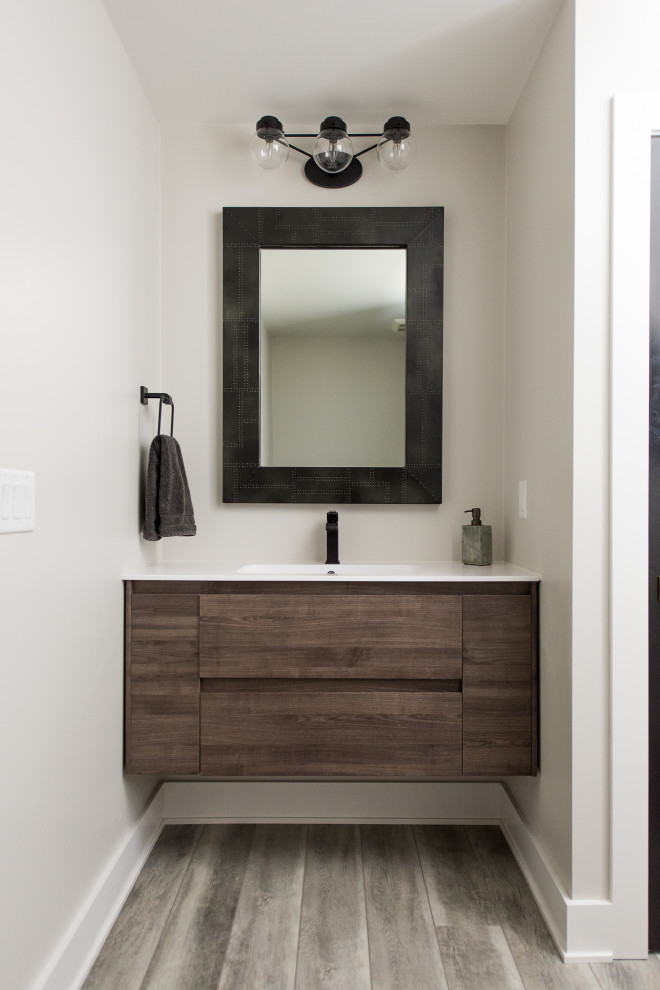 Mid-sized modern powder room in Indianapolis with flat-panel cabinets, grey cabinets, beige walls, dark hardwood floors, an undermount sink, engineered quartz benchtops and white benchtops.