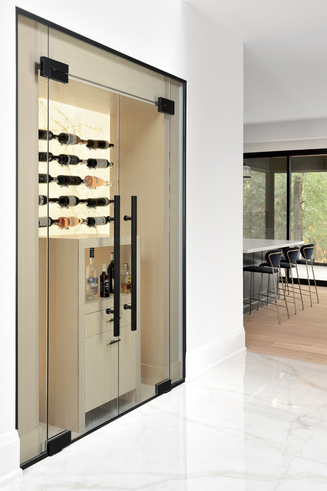 Example of a transitional home design design in Toronto