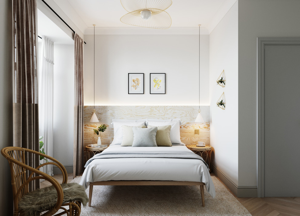 エディンバラにある小さな北欧スタイルのおしゃれな主寝室 (白い壁、ラミネートの床、暖炉なし、茶色い床)