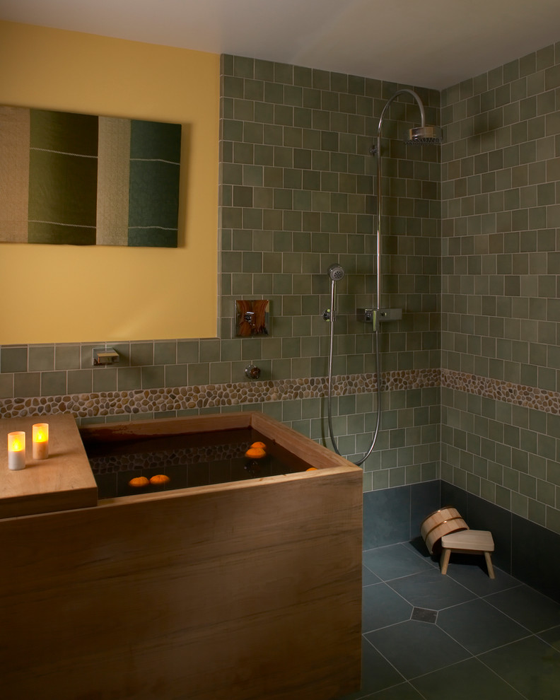 Photo of a mid-sized master bathroom in San Francisco with a japanese tub, an open shower, green tile, ceramic tile, multi-coloured walls, ceramic floors, green floor and an open shower.