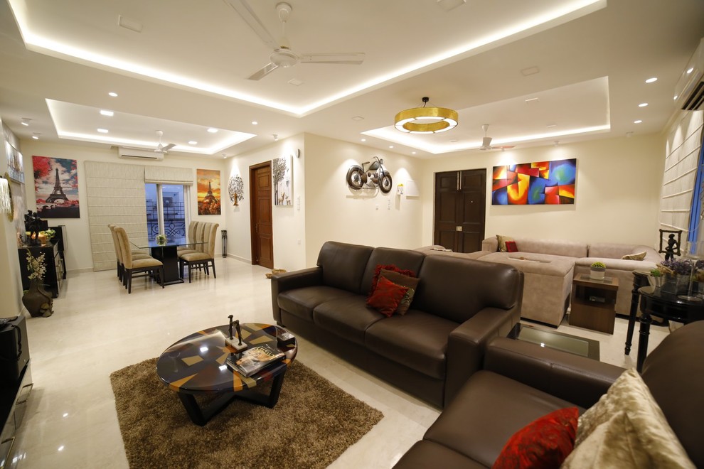 Design ideas for a contemporary living room in Kolkata.