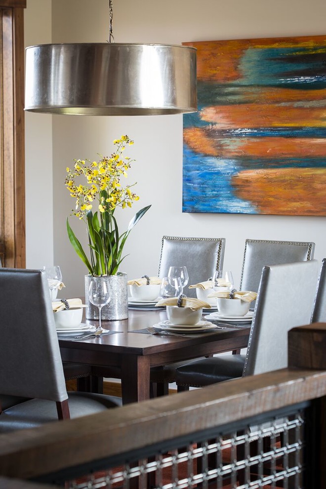 Example of a mid-sized transitional medium tone wood floor kitchen/dining room combo design with white walls and no fireplace