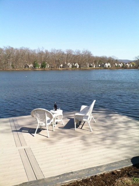 Mountain style backyard dock photo in New York
