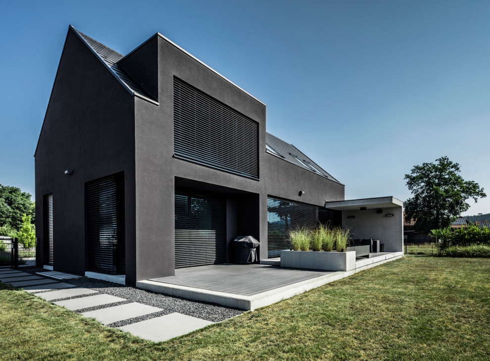 Источник вдохновения для домашнего уюта: большой, двухэтажный дом в современном стиле с облицовкой из бетона