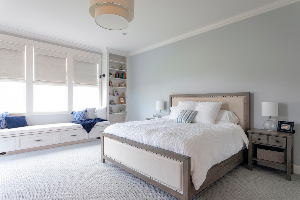 Photo of a transitional bedroom in Seattle with grey walls, carpet and grey floor.