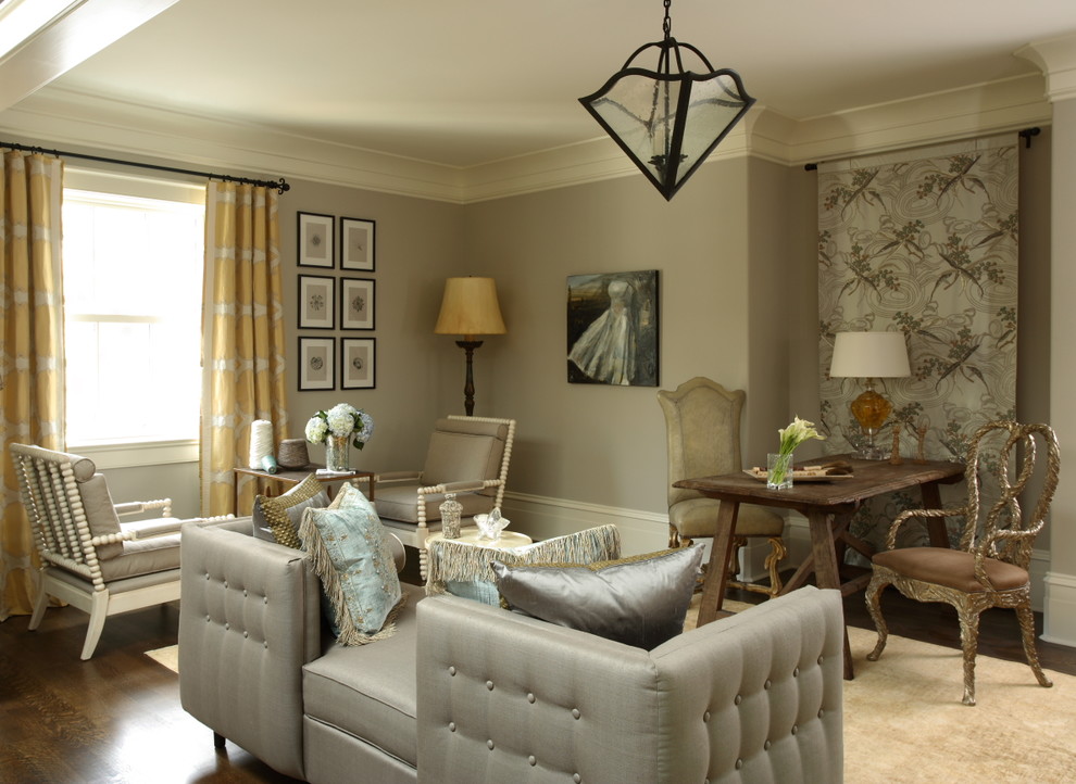 This is an example of a traditional living room in Atlanta with grey walls.