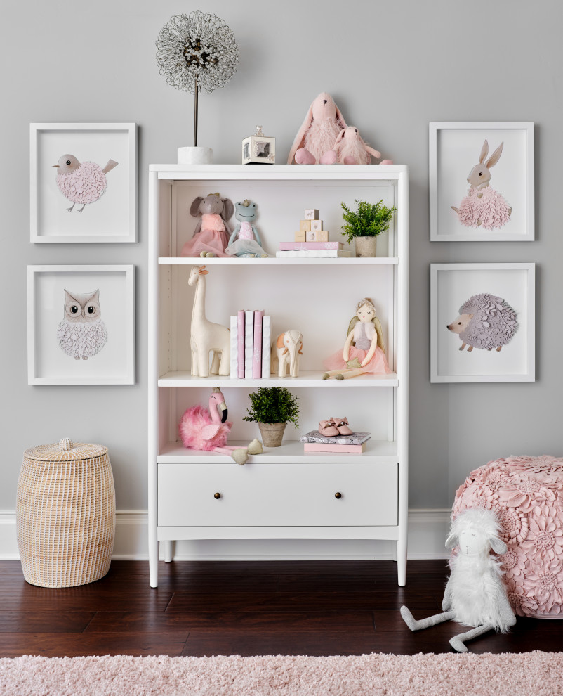 Shadylane Nursery- Design & Furnishings - Our team was thrilled to design and furnish a beautiful blush nursery for baby Sloan's imminent arrival.  The large scale rose wallpaper was the inspiration for the room's feminine design.  Pale gray walls provide a quiet backdrop to the patterned wallpaper.  Blush window treatments, crisp white furniture, and beautifully detailed children's artwork finish the space.  The natural light flooding through the windows provides a tranquil space for a newborn baby.