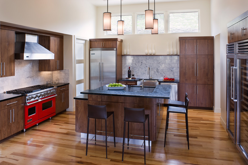 This is an example of a contemporary kitchen in Austin with stainless steel appliances.