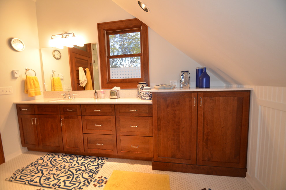 Inspiration for a small transitional master white tile and ceramic tile ceramic tile bathroom remodel with recessed-panel cabinets, dark wood cabinets, a two-piece toilet, white walls, an undermount sink and quartz countertops