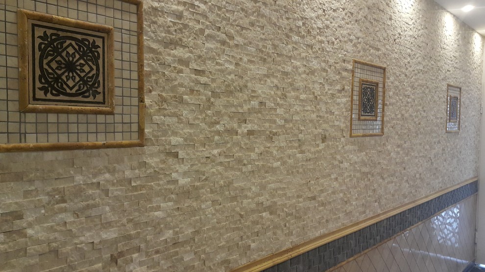 Elegant entryway photo with beige walls