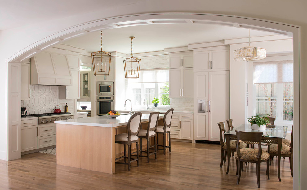 This is an example of a transitional kitchen in Dallas.