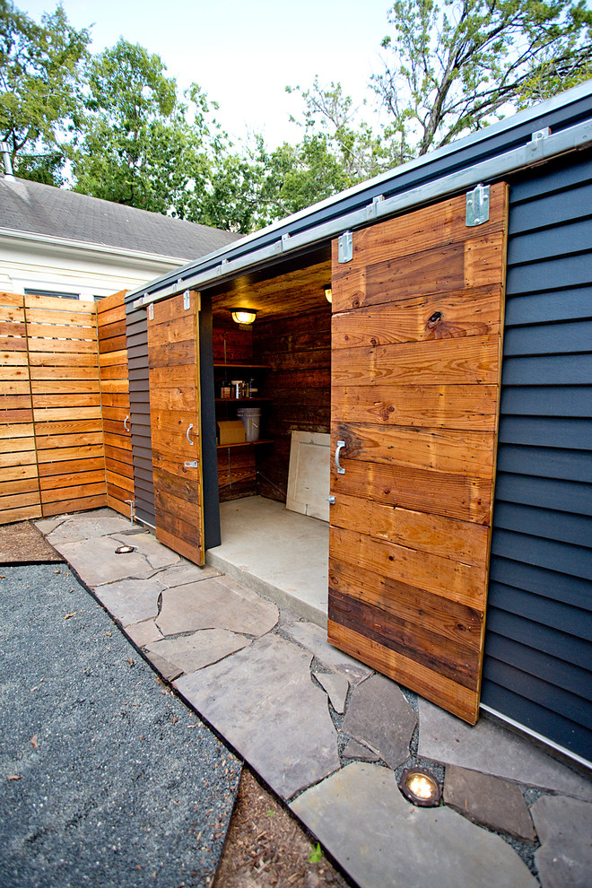 Photo of a small contemporary detached garden shed in Houston.