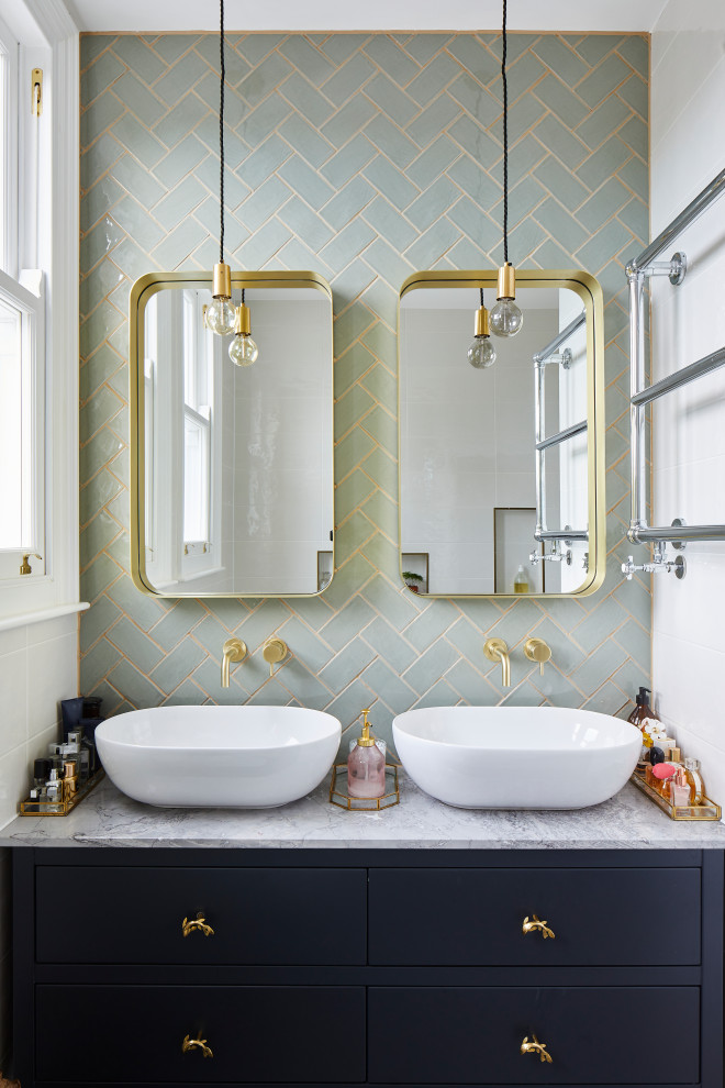 Small transitional white tile multicolored floor bathroom photo in London with a wall-mount toilet, white walls, a vessel sink, terrazzo countertops, gray countertops and a floating vanity