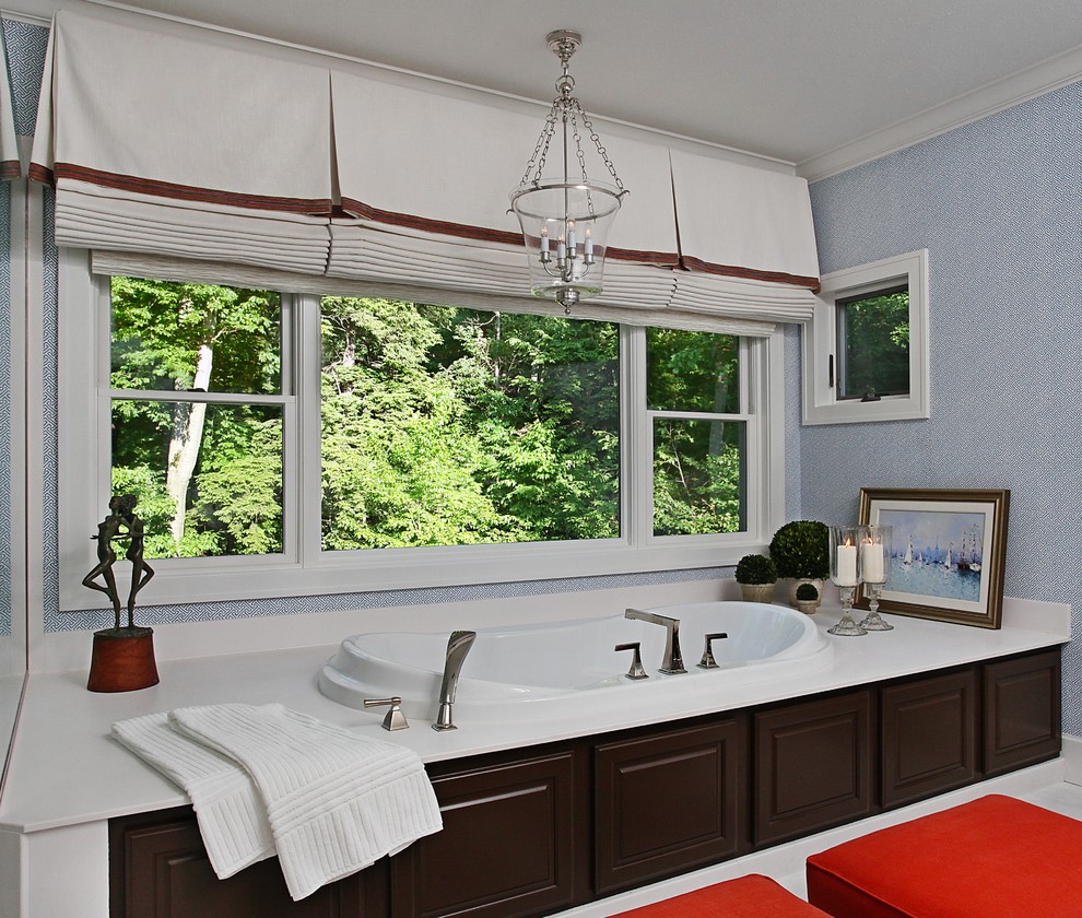 Inspiration for a large traditional master bathroom in Detroit with a drop-in tub and grey walls.
