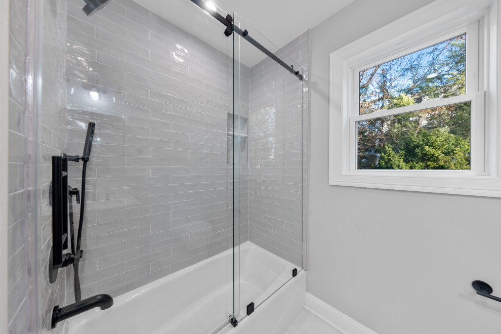 Tub-Shower with Glass Door and Black Fixtures