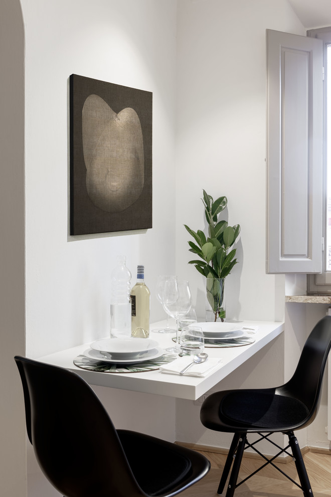 This is an example of a contemporary dining room in Florence.