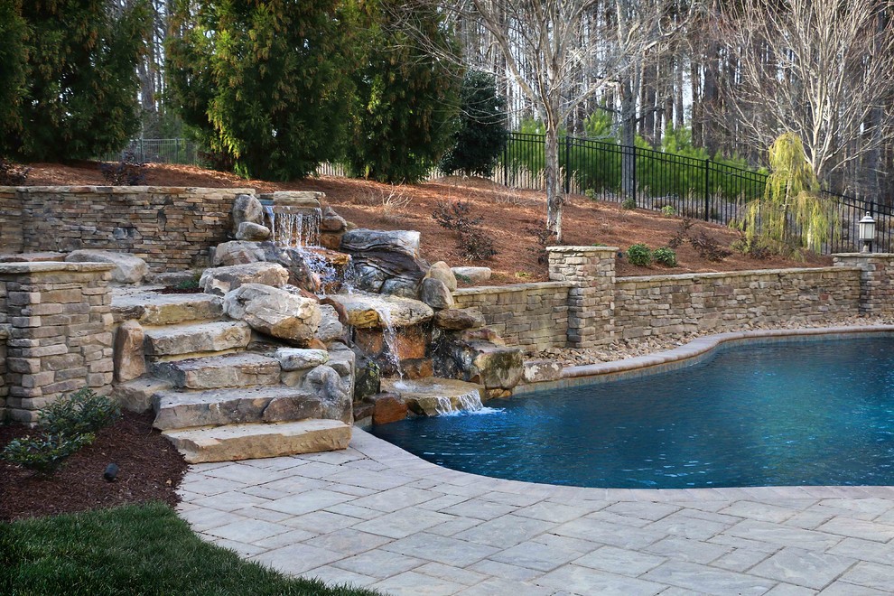 Example of a mountain style home design design in Raleigh