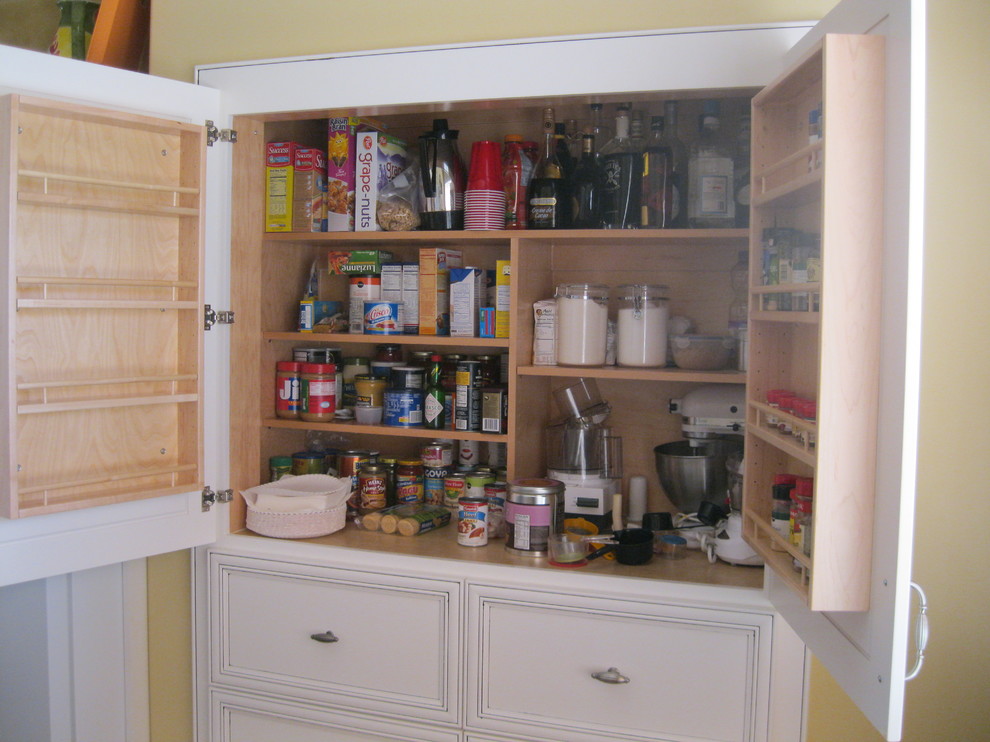 Small elegant kitchen pantry photo in Miami with recessed-panel cabinets and white cabinets