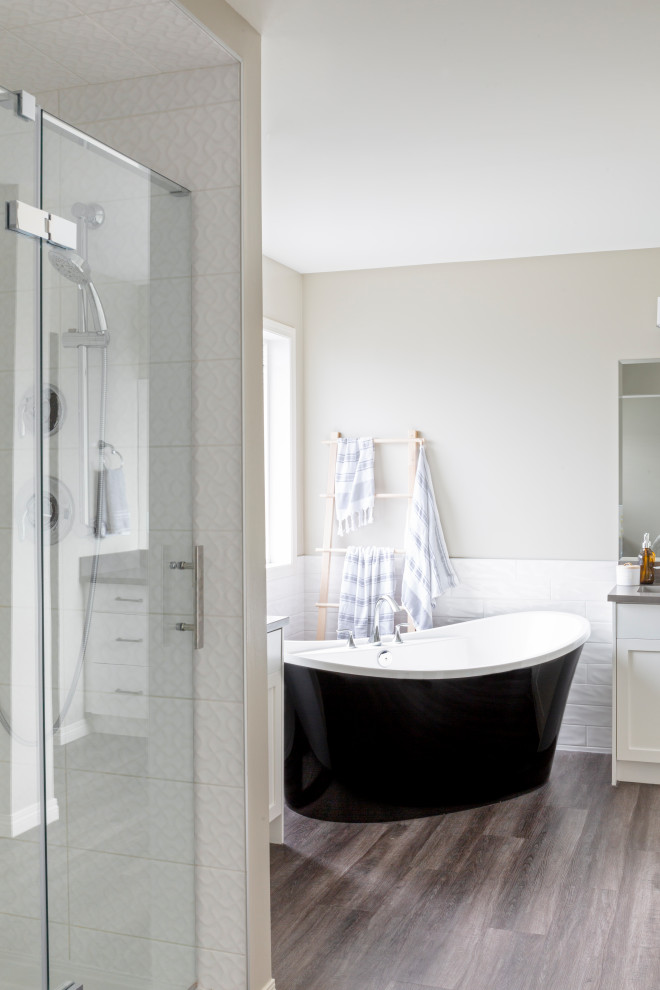 Inspiration for a large transitional master bathroom in Calgary with shaker cabinets, white cabinets, white tile, engineered quartz benchtops and grey benchtops.