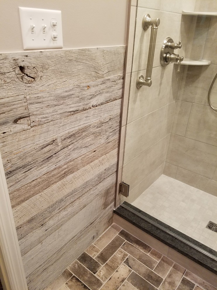 Inspiration for a small rustic kids' gray tile and porcelain tile porcelain tile and gray floor home design remodel with furniture-like cabinets, distressed cabinets, a two-piece toilet, gray walls, an undermount sink, granite countertops and a hinged shower door