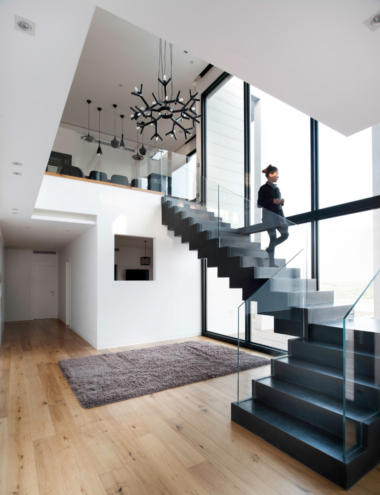 Inspiration for a contemporary l-shaped staircase in Other.