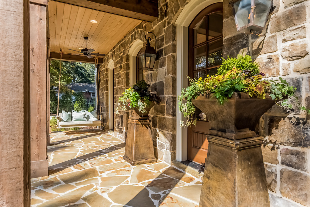 Example of a mid-sized transitional slate floor front door design in Atlanta with multicolored walls and a glass front door