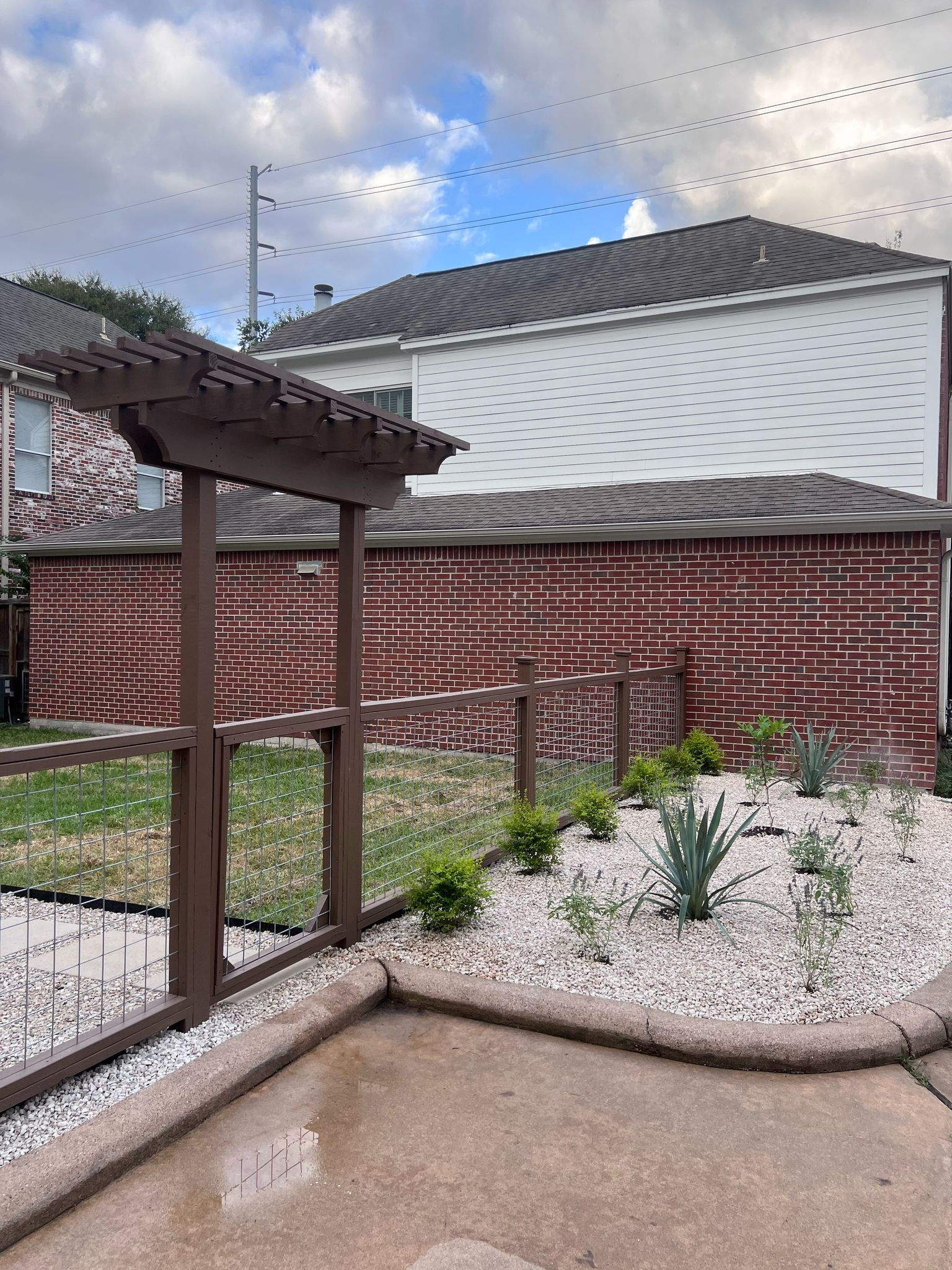 Beautiful stamped concrete patio with Pergola Cover on Haddon st!