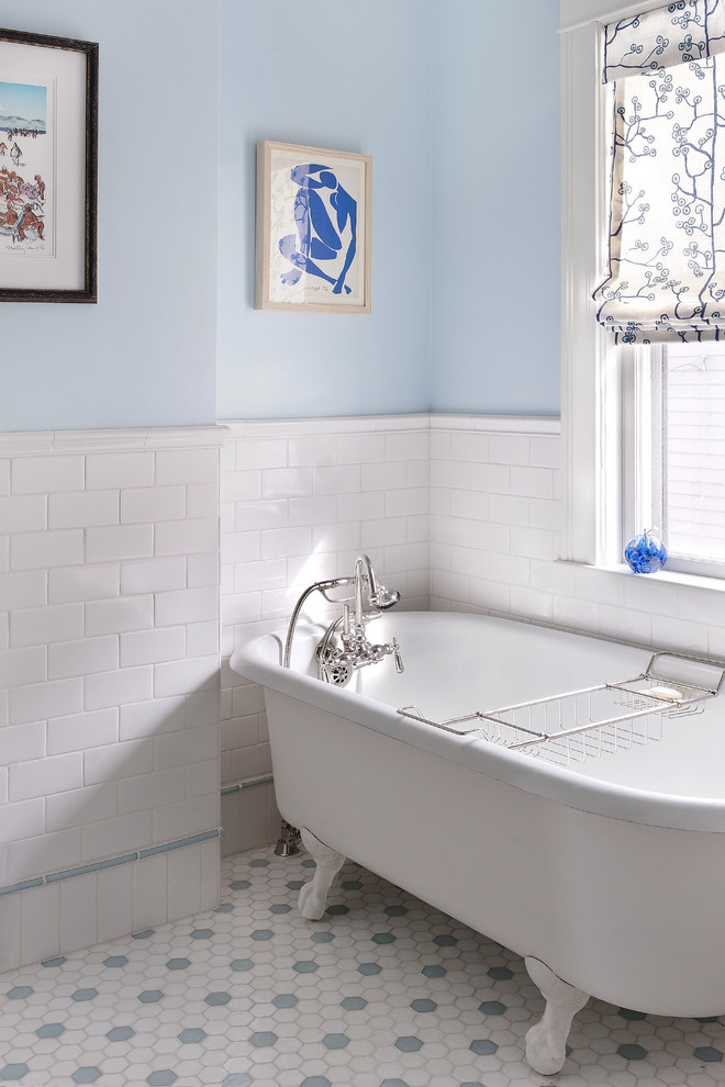Inspiration for a traditional bathroom in Boston with a claw-foot tub.