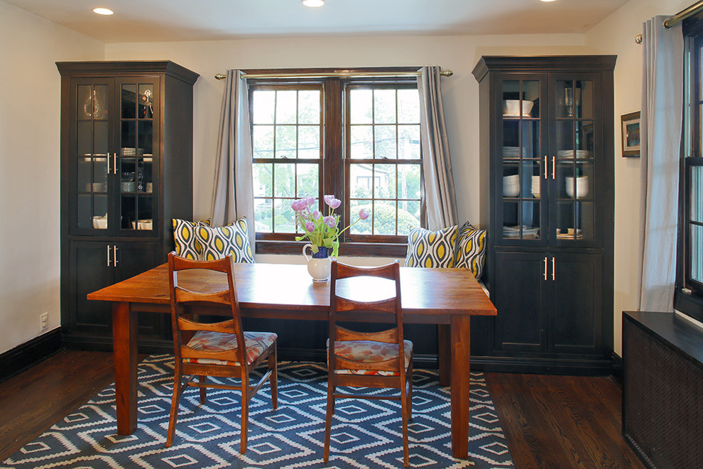 Inspiration for a mid-sized transitional galley medium tone wood floor eat-in kitchen remodel with a farmhouse sink, beaded inset cabinets, dark wood cabinets, granite countertops, beige backsplash, ceramic backsplash, stainless steel appliances, multicolored walls and an island