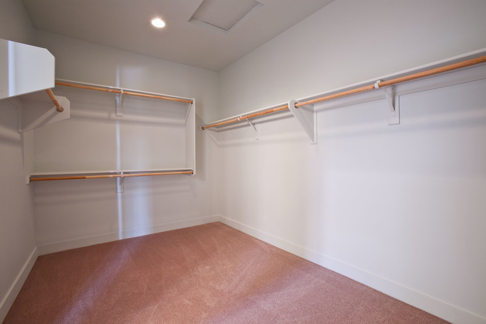This is an example of a transitional storage and wardrobe in Phoenix.