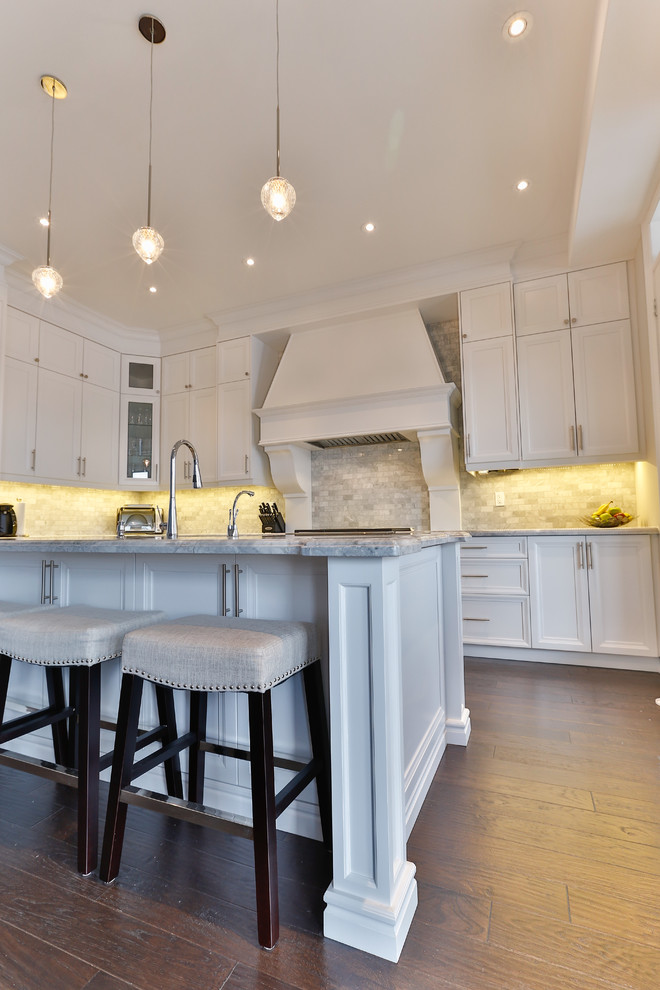 Example of a transitional kitchen design in Toronto