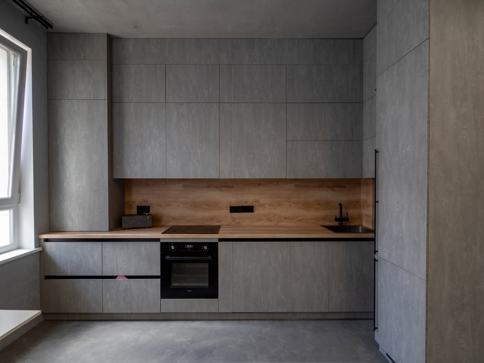 Элегантная минималистичная кухня в сером цвете