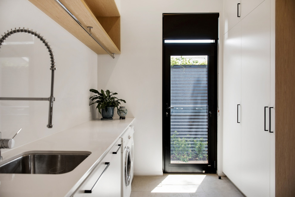 Design ideas for a contemporary laundry room in Adelaide.