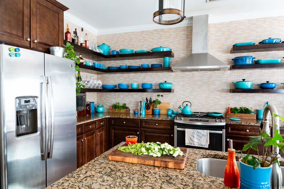 Inspiration for a mid-sized transitional l-shaped laminate floor and brown floor open concept kitchen remodel in Charleston with a single-bowl sink, raised-panel cabinets, dark wood cabinets, granite countertops, multicolored backsplash, mosaic tile backsplash, stainless steel appliances, an island and multicolored countertops