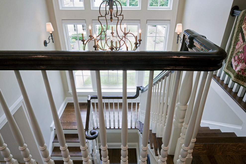 Mid-sized traditional wood l-shaped staircase in Baltimore with wood risers.