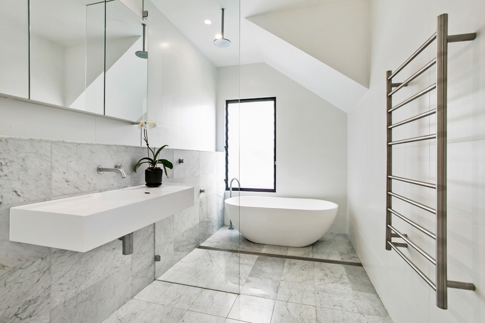 Large contemporary master bathroom in Sydney with a freestanding tub, white walls, marble floors, an integrated sink, grey floor, white benchtops, a curbless shower, gray tile, marble and an open shower.