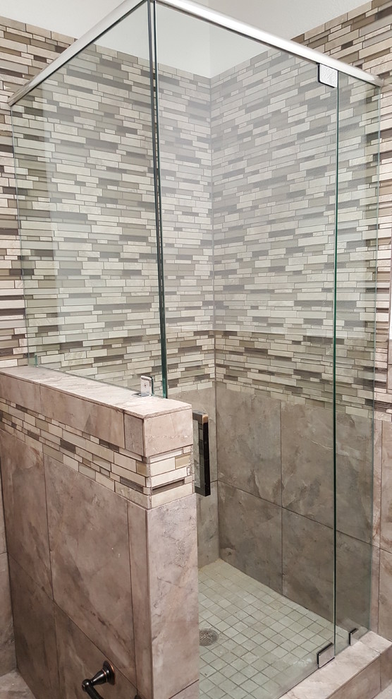Inspiration for a mid-sized transitional master bathroom in Austin with a corner shower, beige tile, matchstick tile, white walls and travertine floors.