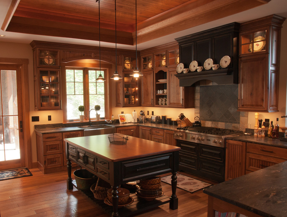 Example of a mountain style kitchen design in Edmonton