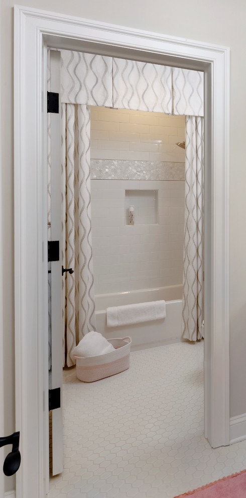 Inspiration for a mid-sized traditional kids bathroom in DC Metro with flat-panel cabinets, white cabinets, an alcove tub, a shower/bathtub combo, a two-piece toilet, white tile, grey walls, ceramic floors, an undermount sink, engineered quartz benchtops, white floor, a shower curtain and subway tile.