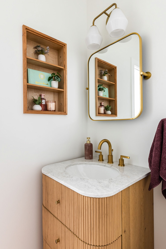 Phoenix Rising in Chicago - Transitional powder room photo in Chicago