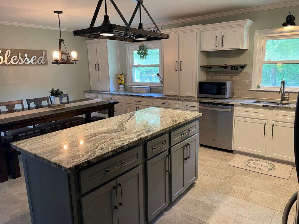 This is an example of a large classic l-shaped kitchen/diner in Charleston with shaker cabinets, granite worktops, metro tiled splashback and an island.