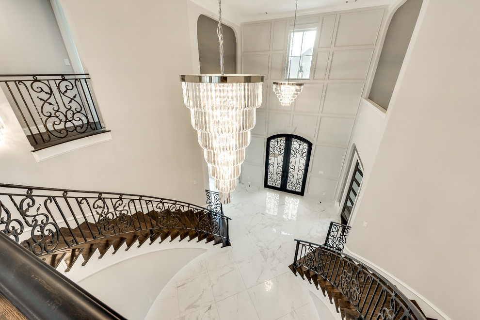 Inspiration for a large transitional foyer in Dallas with grey walls, marble floors, a double front door, a black front door and white floor.