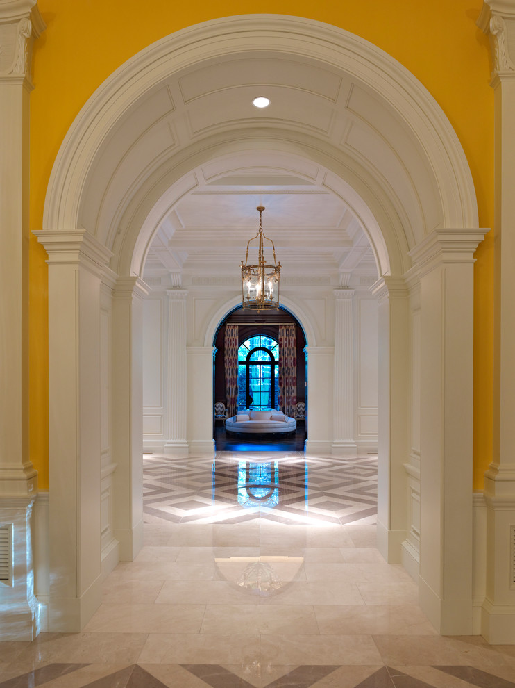 Design ideas for an expansive traditional hallway in Dallas with yellow walls.