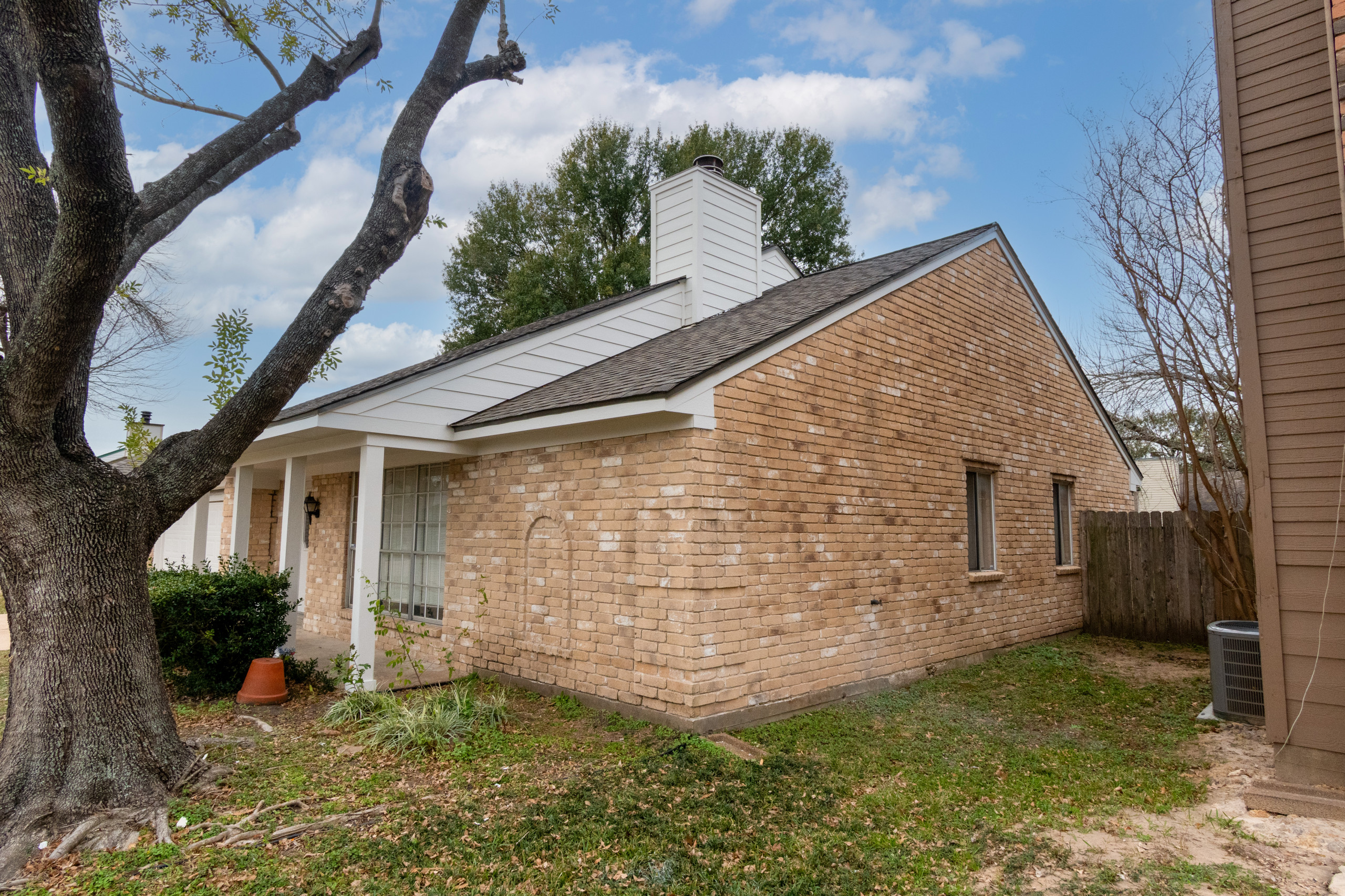 Brick Home Refresh with Hardie Siding, Fascia, Soffit, and Modern Column Replace