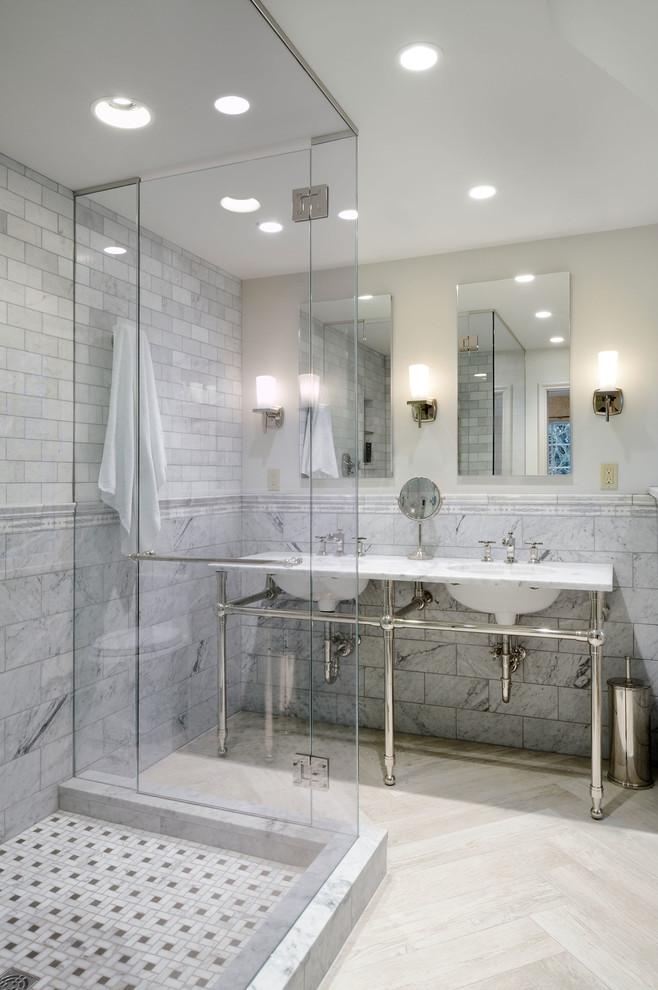 Photo of a traditional bathroom in Seattle with a corner shower, white tile, stone tile and beige walls.